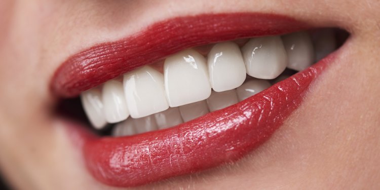 Dental Implants or Dentures: